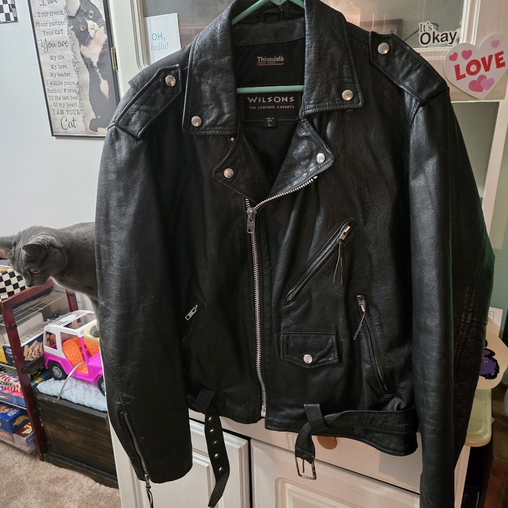 Wilson's leather jacket Harley-Davidson patches on the back